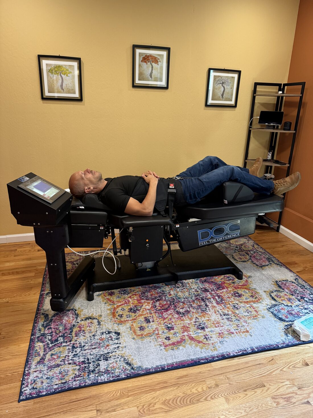 Patient relaxing during a non-surgical spinal decompression session on the DOC table at SF City Chiropractic in San Francisco