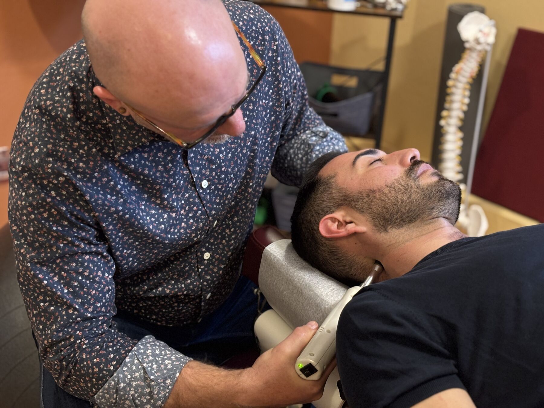 Dr. Cameron Quillian giving a gentle chiropractic adjustment at SF City Chiropractic